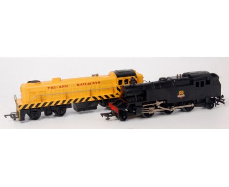 An early Triang R59 black 2-6-2 tank engine (G), and a later yellow TC series Bo-Bo diesel switcher (G)