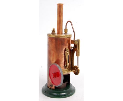 Burnac, England, small vertical steam engine missing burner, copper clad boiler and copper chimney, fitted with safety valve 