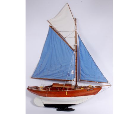 Kit built scale model of a French Yacht titled "Sea Bird", comprising of white and black hull with stained wooden upper secti