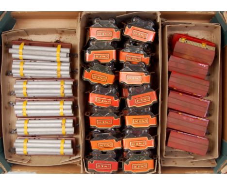 A large tray containing 3x trade packs of Wells/Brimtoy items including 28x4 wheel LNER orange/red tenders, 6x bogie lumber w