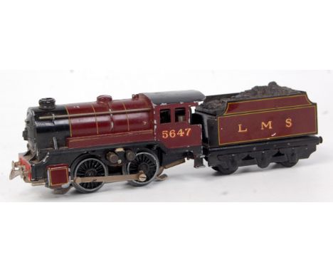 A Trix Twin Railway prewar freelance 0-4-0 engine and tender LMS lined maroon No. 5647, some paint loss to raised edges mainl