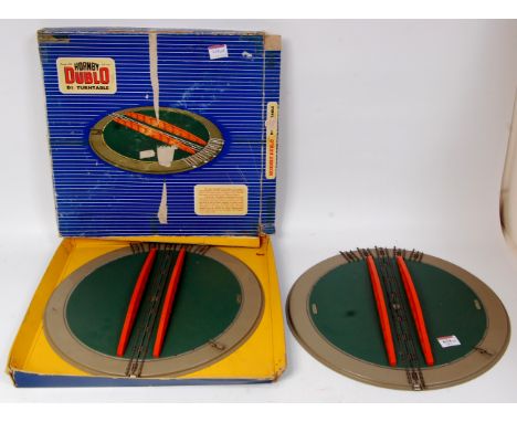 2 Hornby Dublo D1 turntables both in clean condition, one in poor box (G-BP)