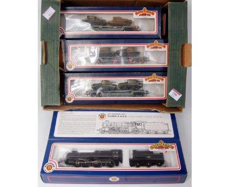 A Bachmann 31-103 BR Standard class 4 engine and tender (NM-BNM) together with 6 45 ton bogie well wagons BR grey (NM-BF GNM)