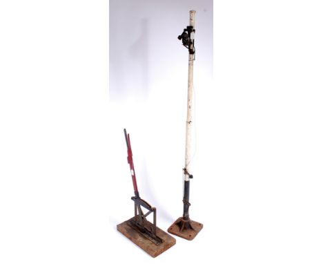 A garden railway signal pole, fitted with lamp, missing signal arm, sold with a hand operated signal lever