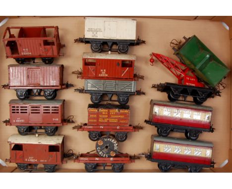 A large tray of postwar Hornby items including NE flat with cable drum, NE flat with container, NE open, NE refrigerator, 2x 