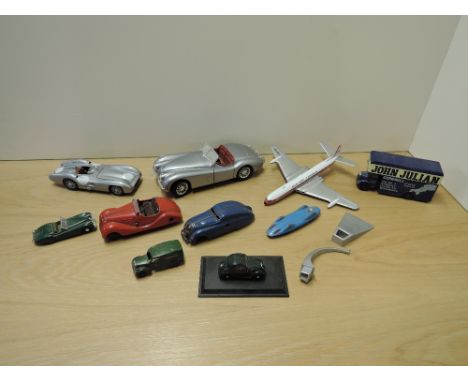 A selection of mixed vintage playworn die-casts including early Dinky Cornwall Van, Corgi Bluebird Record Car, Schuco Examico