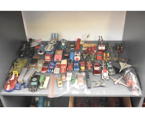 A shelf of playworn die-casts including Dinky, Corgi, Matchbox Lesney etc, Military.Chitty Chitty Bang Bang, Concorde, Green 