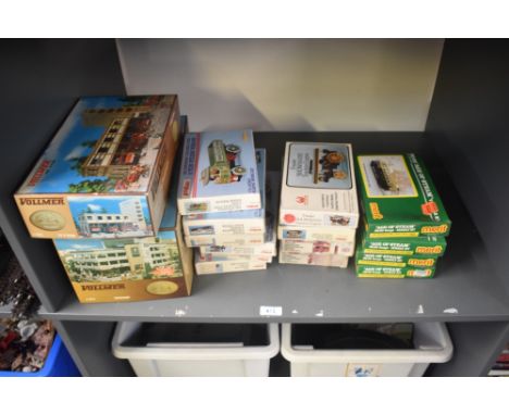 A shelf of plastic kits, Vollmer HO scale, 3802 Multi Storey Car Park, 3759 City Fire Station, Keil Kraft 1:72 scale 1920 Ope