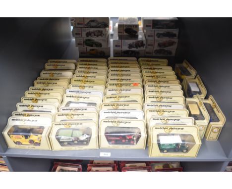 A shelf of Matchbox Models of Yesteryear die-casts, Vintage Trucks 54 in total, all in window display boxes