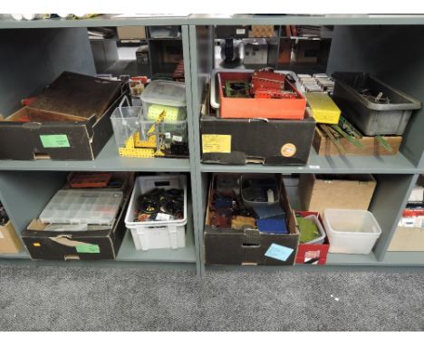 Eight shelves of mixed vintage Meccano, many parts and accessories seen