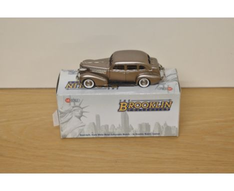 A Brooklin Models The Brooklin Collection 1:43 scale die-cast, BRK 156 1937 Oldsmobile L-37 Touring Sedan, tulipwood brown po