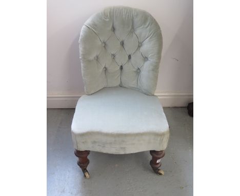 A Victorian button back nursing chair, 71cm tall 