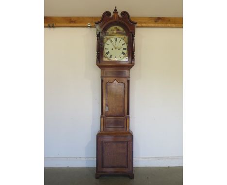 A good quality Victorian north country style long case clock with an oak/mahogany case and decorative fruitwood front, 8 day 