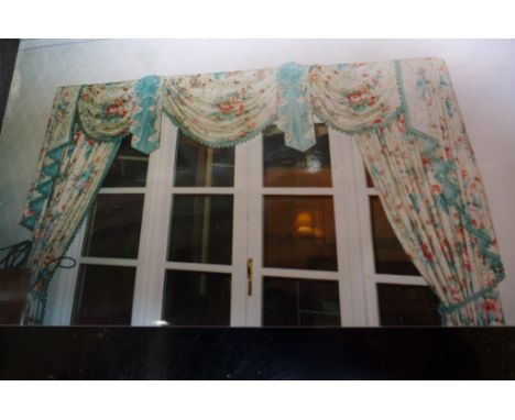 A pair of light green lined, with roses design and swags, 44 inch wide and 96 inch drop curtains 