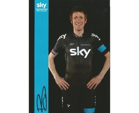 Bradley Wiggins signed 6x4 promotional Team Sky photo. Brief biography on reverse. British former professional road and track