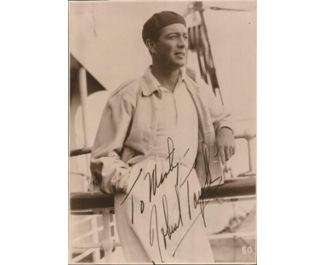 Robert Taylor signed 8x6 vintage photo. August 5, 1911 June 8, 1969 was an American film and television actor who was one of 