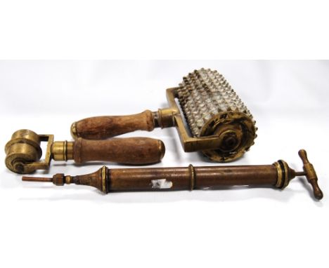 20th century brass concrete pavement roller by Gilchrist of Glasgow, 30cm long, another Gilchrist concrete sectioning roller,