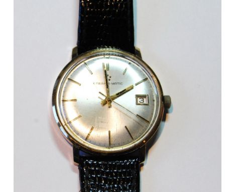 Gent's Eterna Matic 9ct gold watch, 'Hoover Limited 1949 - 1974' on strap. Condition Report Going.  In used condition, but OK