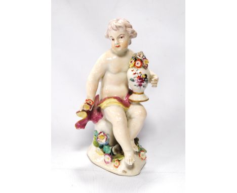 Derby porcelain figure of a boy holding a vase of flowers, c. 1770, patch marks to the base, 16cm high.