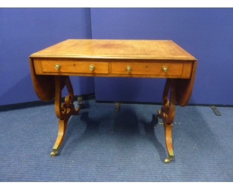 19th century satin mahogany sofa table with rosewood crossbanding, two frieze drawers and raised on scroll cheval supports an
