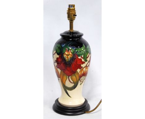 Moorcroft Anna Lily pattern table lamp of baluster form, 38cm high.