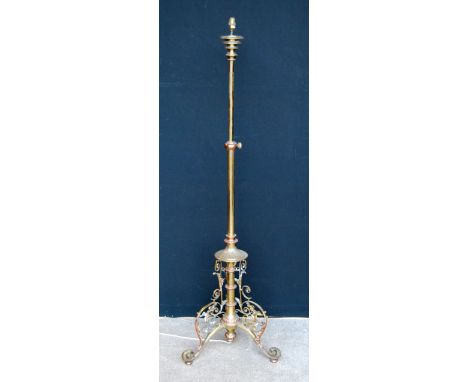 Victorian tubular brass and copper telescopic standard lamp.