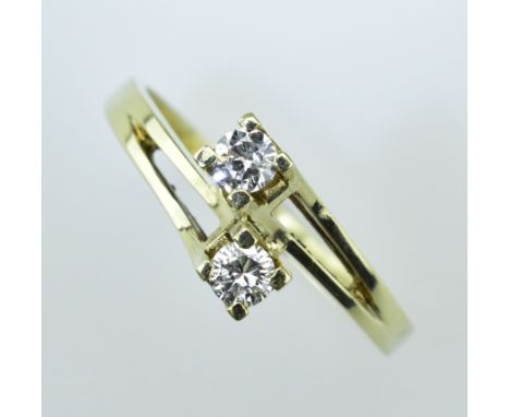 Toi-et-Moi-Ring. Zwei Brillanten zus. 0,25 ct. Weiß (wesselton)-vsi. 14 ct. GG