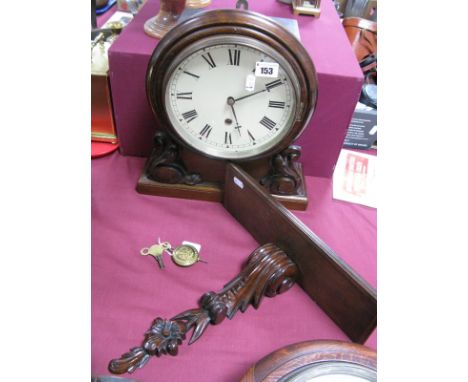 A Mahogany Cased Wall Clock, 8" white enamel dial, Roman numerals, the casing with carved scroll supports, with a foliate car