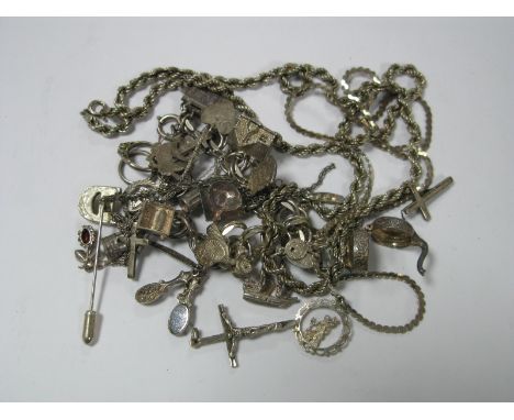 A Double Curb Link Bracelet, stamped "Sterling" to fastener, suspending novelty charms, including a wishing well, a horse sho