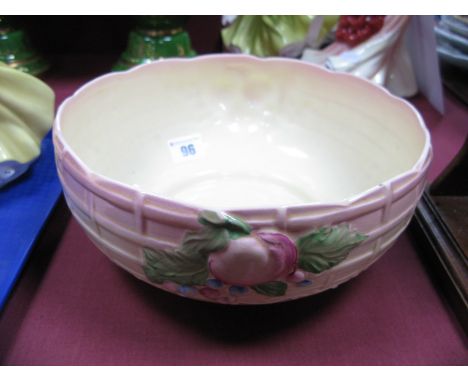 A Clarice Cliff Newport Pottery Bowl, moulded decoration on a pink/cream ground base numbered 883.