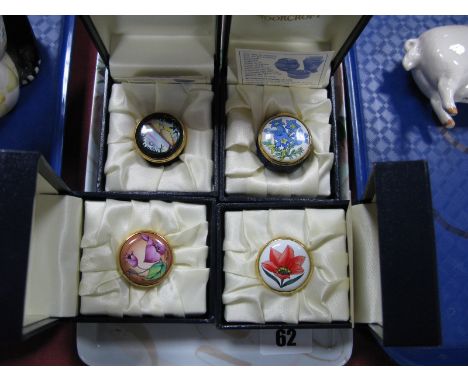 Four Moorcroft Enamel Circular Trinket Boxes, painted with 'Lake Windermere', Blue Gentian, Tulip and Bougainvillea, each 3cm