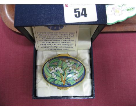 A Moorcroft Enamel Oval Trinket box, of oval form, painted in the 'Lily of the Valley' pattern, designed by Philip Gibson, 6.