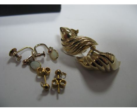 A Pair of Ladies Stylish Clip on Earrings, of textured swirl design, stamped "375", a pair of opal coloured drop earrings, st