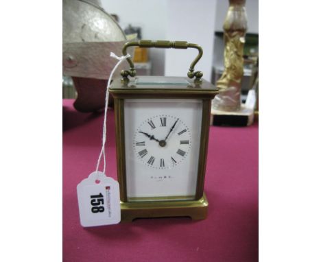 An Early to Mid XX Century Brass Cased Carriage Clock, indistinctly stamped W.Lion &amp; ....