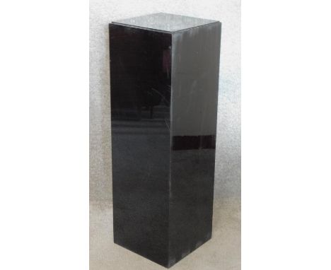 A contemporary lacquered lamp stand. H.104 W.33 D.33cm 