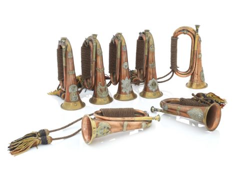 A SET OF SEVEN SCOTTISH REGIMENTAL COPPER AND BRASS BUGLESEarly 20th centuryBearing the badges for Black Watch, Gordon Highla