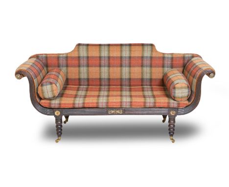 A SCOTTISH REGENCY BRASS MOUNTED SCUMBLED ROSEWOOD SETTEEThe reeded frame with scroll arms, with tartan uphostery, raised on 