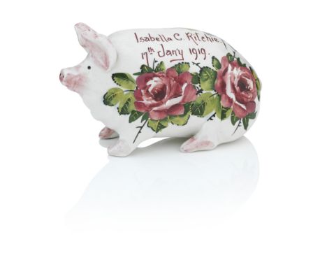 A DOCUMENTARY WEMYSS PIGGY BANKPainted with cabbage roses and with the inscription 'Isabella C Ritchie, 17th Jan'y 1919', pai