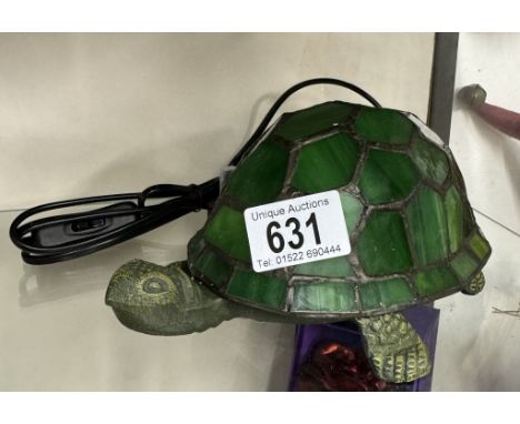 A cast iron &amp; leaded glass tortoise table lamp