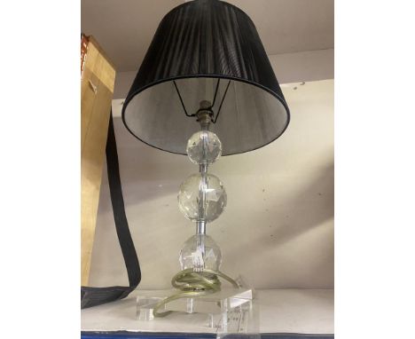 An acrylic table lamp