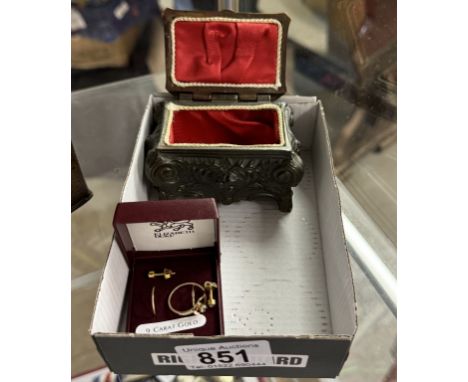A small metal casket with 9ct gold earrings and ring 