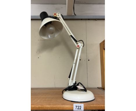 An angle poise lamp