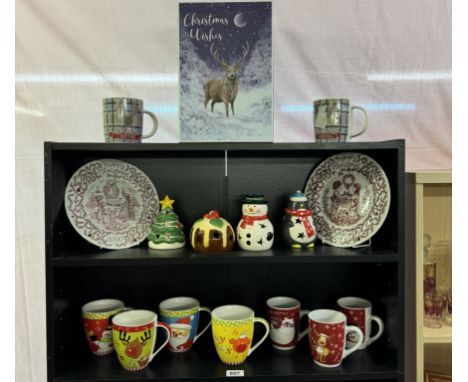 A quantity of Christmas tea light holders, mugs, box and plates