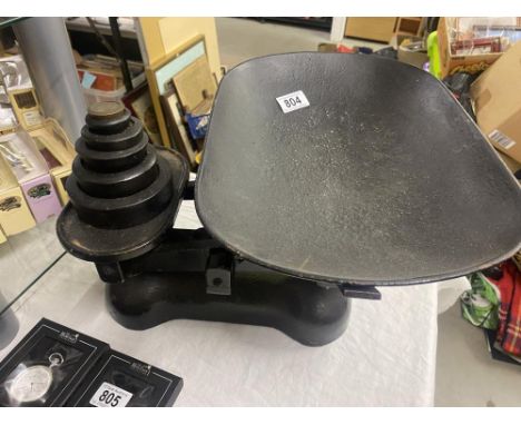 A large set of cast iron scales and weights