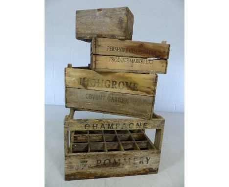 Three vintage wooden produce crates marked Pommery Champagne and Highgrove Covent Garden, alongside a tidy container marked S