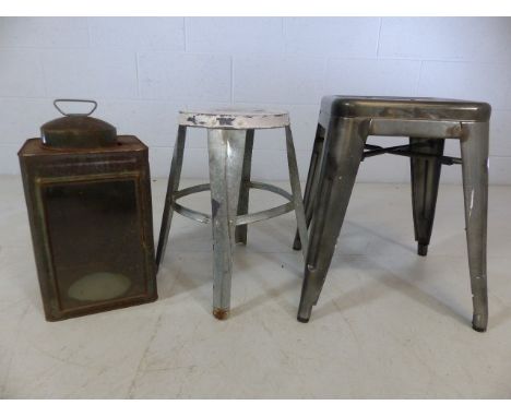 Vintage metal storm lantern and two metal stools
