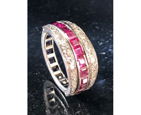 Metamorphic ring with diamond shoulders hinged to flank either a channel of square cut Ruby's or a channel of square cut Sapp