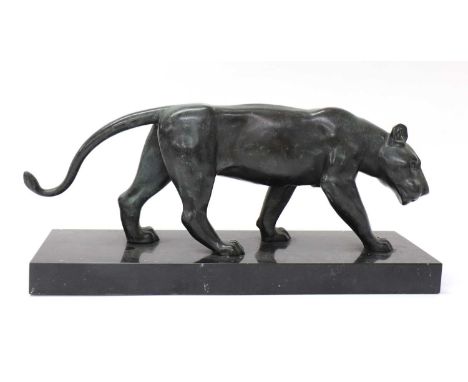A bronze of a prowling lioness20th century, raised on a black marble base, unsigned40cm wide12cm deep28cm high