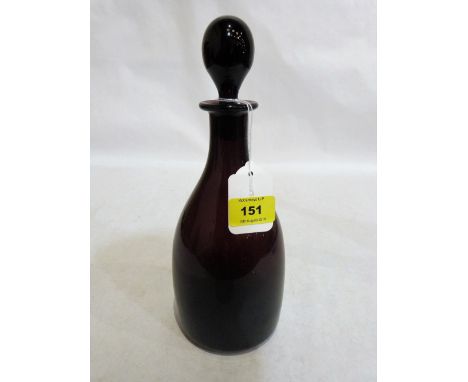 A Victorian amethyst glass decanter and stopper. 11½'' high