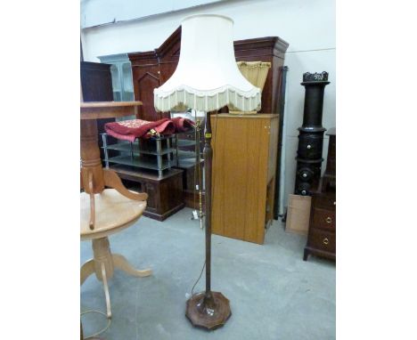 A beechwood lamp standard